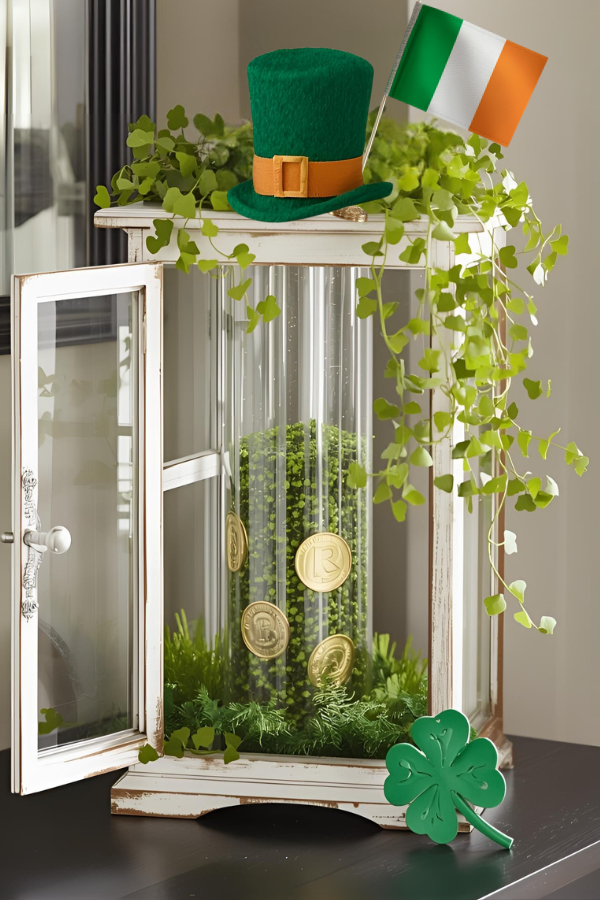White lantern decorated with leprechaun hat, Irish flag, and green shamrock accents for St. Patrick’s Day