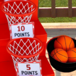 DIY basketball toss game for kids made with laundry baskets and boxes of different heights for outdoor play.