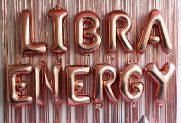 Libra party photo backdrop with rose gold balloon letters