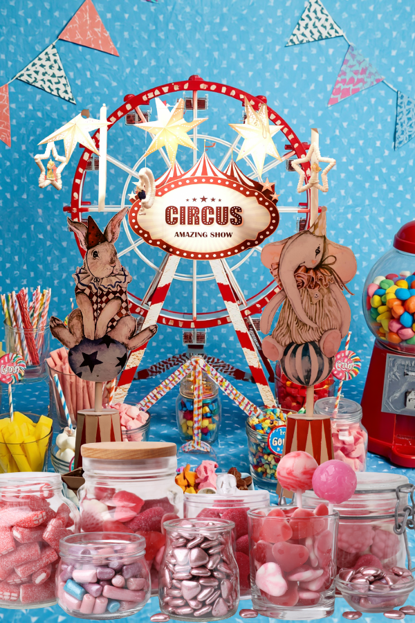 Colorful carnival-themed candy display with a decorative Ferris wheel centerpiece, jars of assorted sweets, a red gumball machine, and festive bunting decorations.